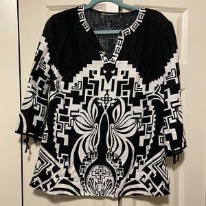 Womens top, worn a few times as a beach cover up.  Size tag removed, believe M